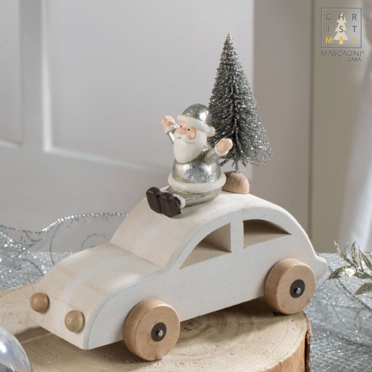 Decorazione per la tavola con macchina e babbo natale