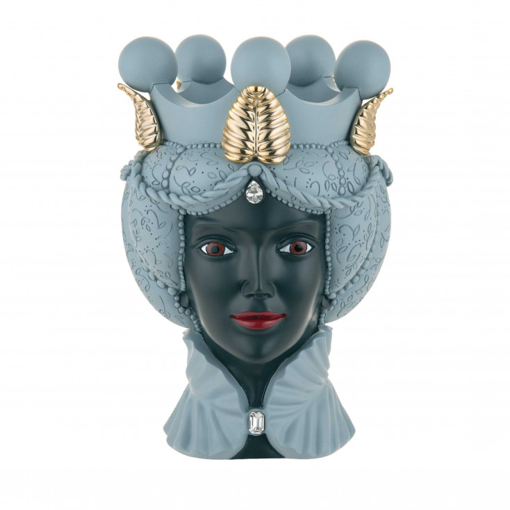 Testa di moro moderna grande con viso di donna in varie colorazioni