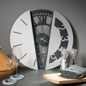 Arti e Mestieri - Modello: Metamorphosis - Orologio da muro rotondo in metallo dal design moderno ed elegante - SKU: 0OR3794 