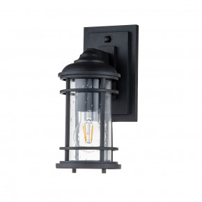 Feiss - Modello: Lighthouse - Lanterna da parete piccola in acciaio con diffusore in vetro a 1 luce - Colore: Nero - Attacco Lampadina: E27 - 1 Lampadina - Watt 60W - Dimmerabile: NO - Grado di Protezione: IP44 - Classe Energetica: A - SKU: FE-LIGHTHOUSE2-S-BLK - Codice EAN: 5024005713814 