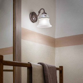 FerroLuce - Modello: Ferrara - Applique rustica struttura in metallo e ceramica decorata a mano - Attacco Lampadina: E14 - 1 Lampadina - Watt 60W - Dimmerabile: NO - Grado di Protezione: IP20 - Classe Energetica: A - SKU: C191-NR-33.DEC.SOO - Codice EAN: 8056598472189 