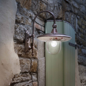 FerroLuce - Modello: Latina - Lampada da parete per esterno con paralume in ceramica decorata a mano - Attacco Lampadina: E27 - 1 Lampadina - Watt 60W - Dimmerabile: NO - Grado di Protezione: IP43 - Classe Energetica: A - SKU: A671-NR-43.DEC.TRS - Codice EAN: 8056598471243 