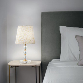 Ideal lux - Modello: Queen - Lampada da tavolo in metallo e cristallo e paralume in tessuto e PVC - Colore: Oro - Attacco Lampadina: E27 - 1 Lampadina - Watt 60W - Dimmerabile: NO - Grado di Protezione: IP20 - SKU: 077741 - Codice EAN: 8021696265995 