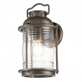 Kichler - Modello: Ashland Bay - Lanterna da parete a 1 luce struttura media in alluminio e diffusore in vetro - Colore: Bronzo - Attacco Lampadina: E27 - 1 Lampadina - Watt 60W - Dimmerabile: NO - Grado di Protezione: IP44 - Classe Energetica: A - SKU: KL-ASHLANDBAY2-M-BU - Codice EAN: 5024005000129 